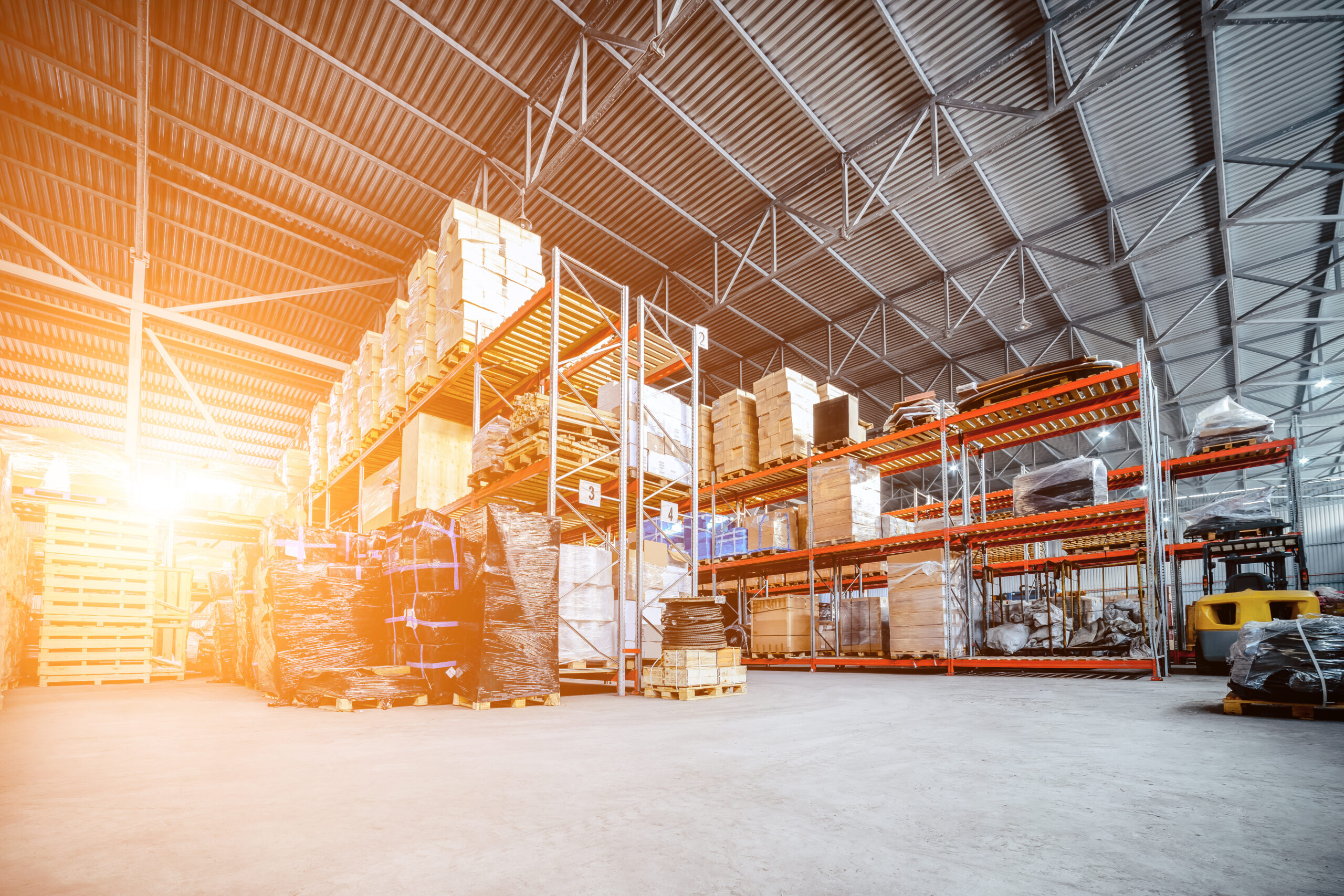 items being stored in large industrial packaging facility