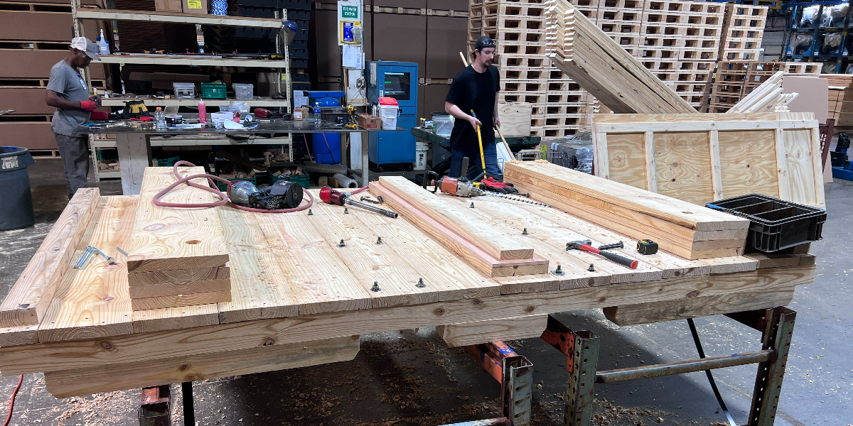 Custom wood crates being built in warehouse